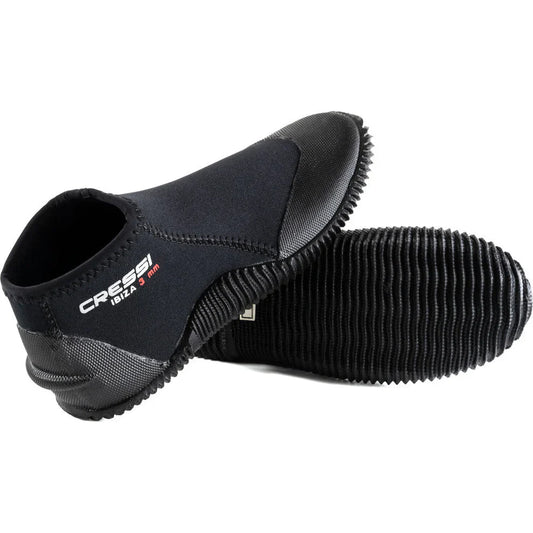 Black Cressi Ibiza 3mm neoprene water sports boots with reinforced toe, heel, non-slip sole, and fin strap holder.