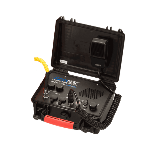 Ocean Reef Alpha Pro X-Divers Surface Unit, hardwired full duplex communication system for professional divers, featuring dual cable ports, adjustable volume, and incorporated speaker.